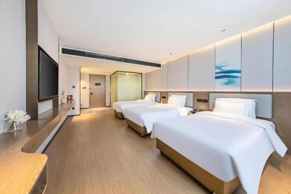 Bed in Yian Business Hotel