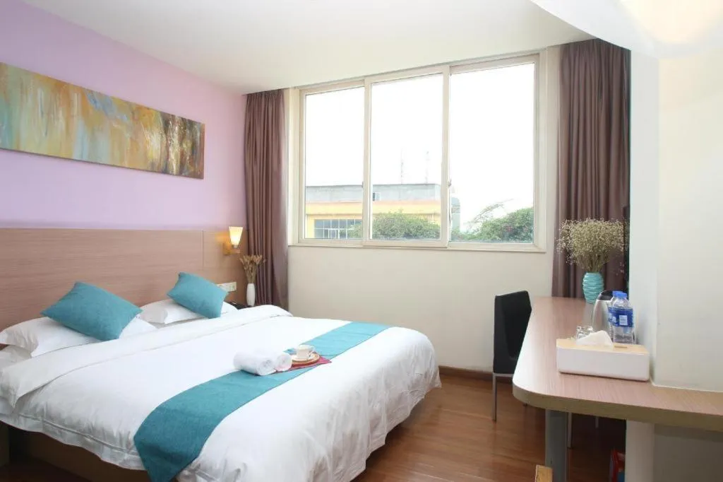 Bed in Yian Business Hotel