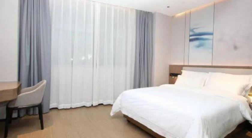 Bed in Yian Business Hotel