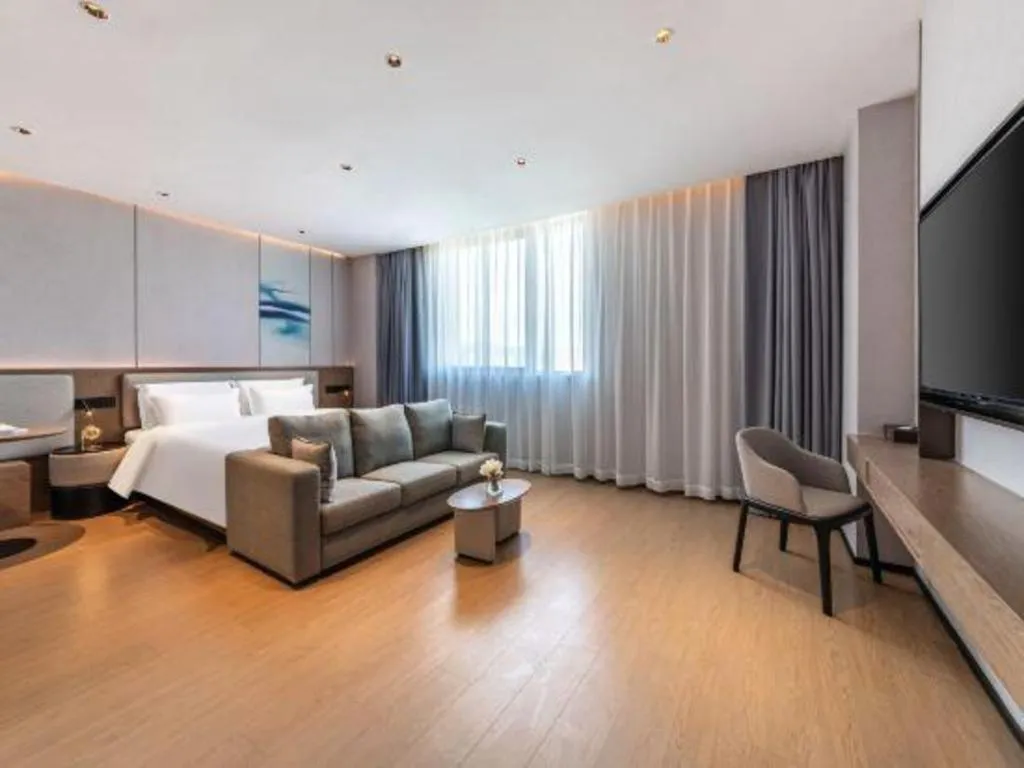 Bed in Yian Business Hotel