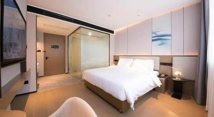 Bed in Yian Business Hotel