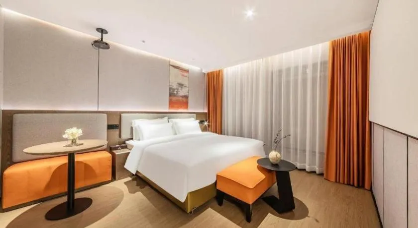 Bed in Yian Business Hotel