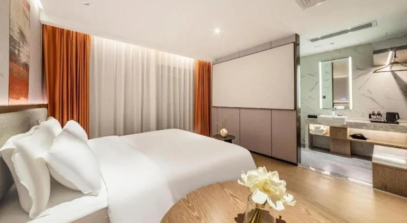 Bed in Yian Business Hotel