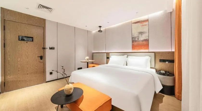 Bed in Yian Business Hotel