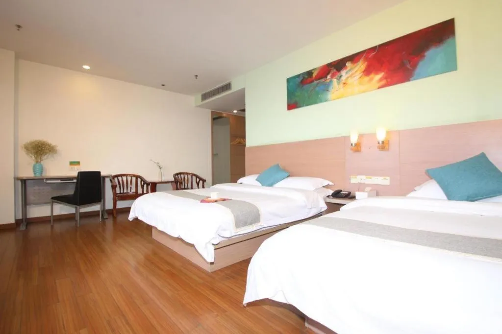 Bed in Yian Business Hotel