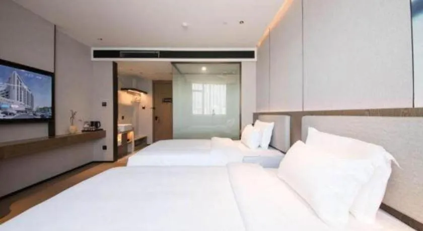 Bed in Yian Business Hotel