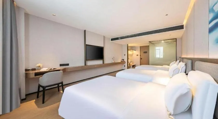Bed in Yian Business Hotel