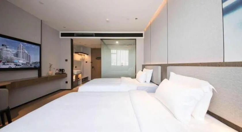 Bed in Yian Business Hotel