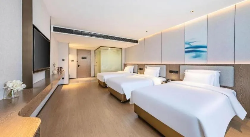 Bed in Yian Business Hotel