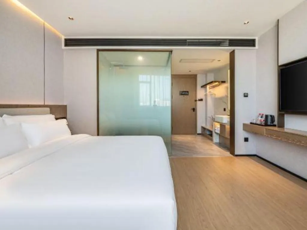 Bed in Yian Business Hotel