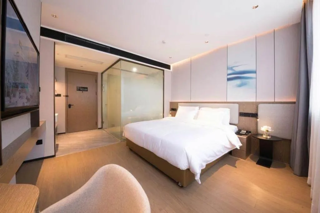 Bed in Yian Business Hotel