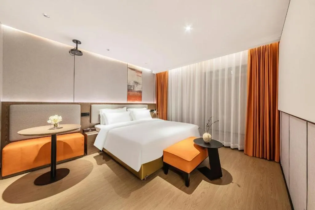 Bed in Yian Business Hotel