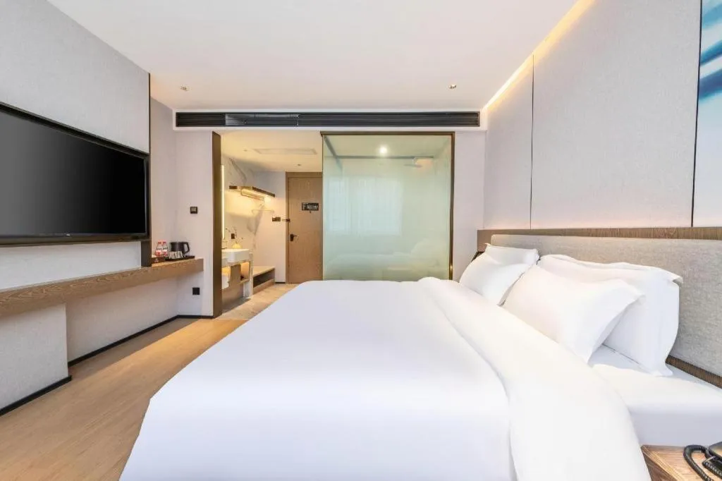 Bed in Yian Business Hotel