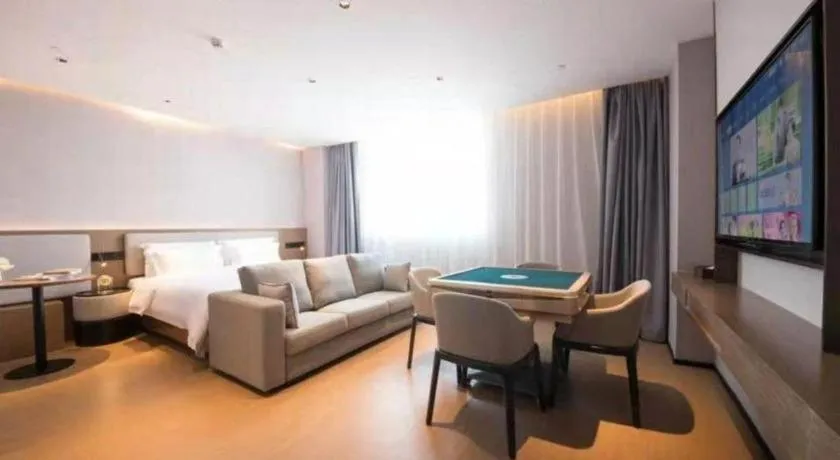 Bed in Yian Business Hotel