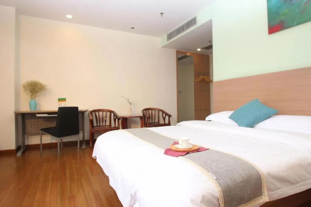 Bed in Yian Business Hotel