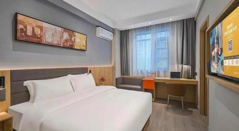 Bed in Jinjiang Inn Wuxi Liangqing Road Wanda Plaza Yunhe Bay Industrial Center