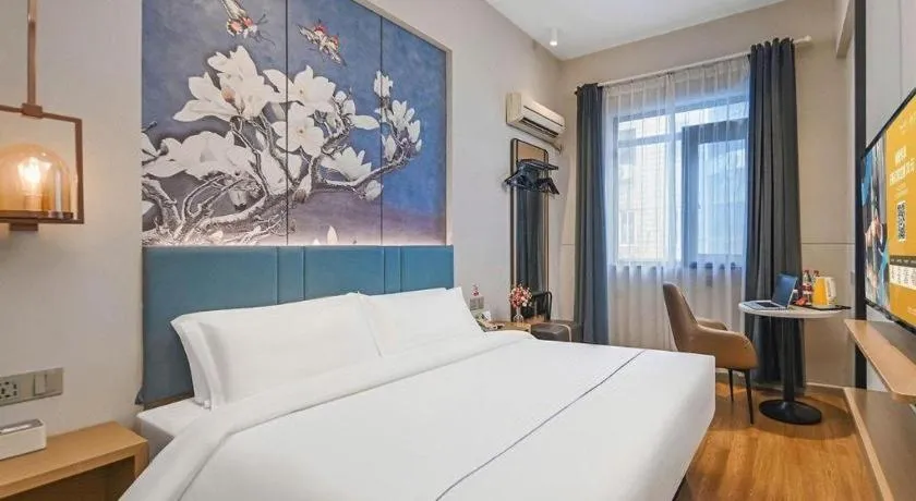 Bed in Jinjiang Inn Wuxi Liangqing Road Wanda Plaza Yunhe Bay Industrial Center