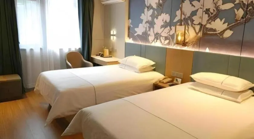 Bed in Jinjiang Inn Wuxi Liangqing Road Wanda Plaza Yunhe Bay Industrial Center