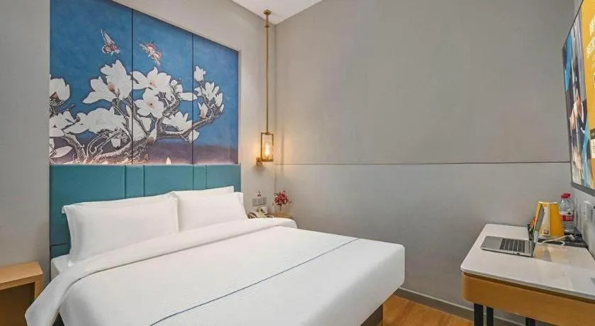 Bed in Jinjiang Inn Wuxi Liangqing Road Wanda Plaza Yunhe Bay Industrial Center