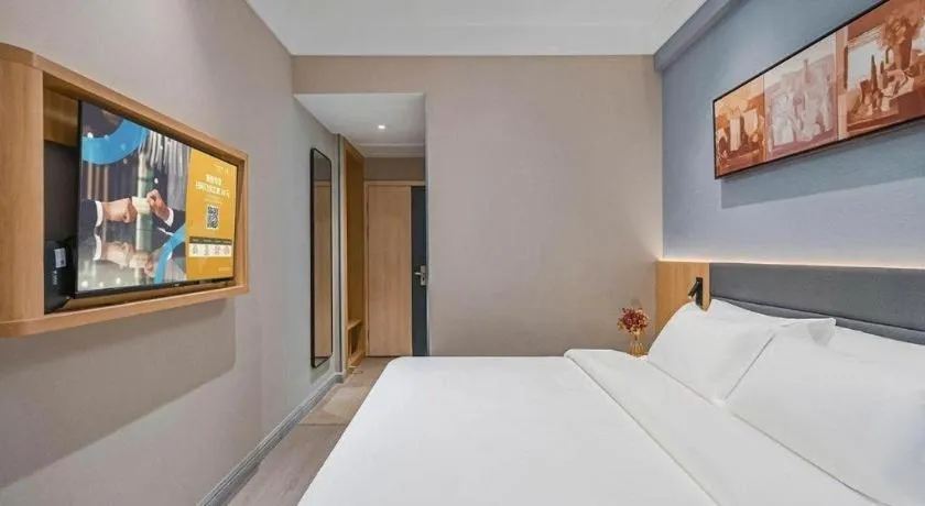 Bed in Jinjiang Inn Wuxi Liangqing Road Wanda Plaza Yunhe Bay Industrial Center