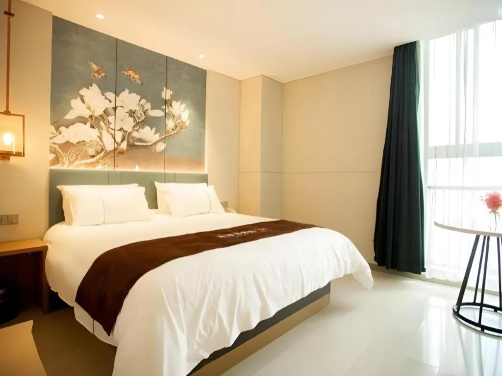 Bed in Jinjiang Inn Wuxi Liangqing Road Wanda Plaza Yunhe Bay Industrial Center