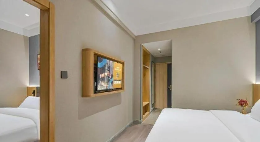 Bed in Jinjiang Inn Wuxi Liangqing Road Wanda Plaza Yunhe Bay Industrial Center