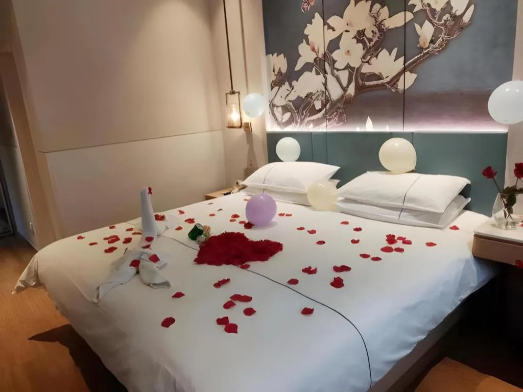 Bed in Jinjiang Inn Wuxi Liangqing Road Wanda Plaza Yunhe Bay Industrial Center