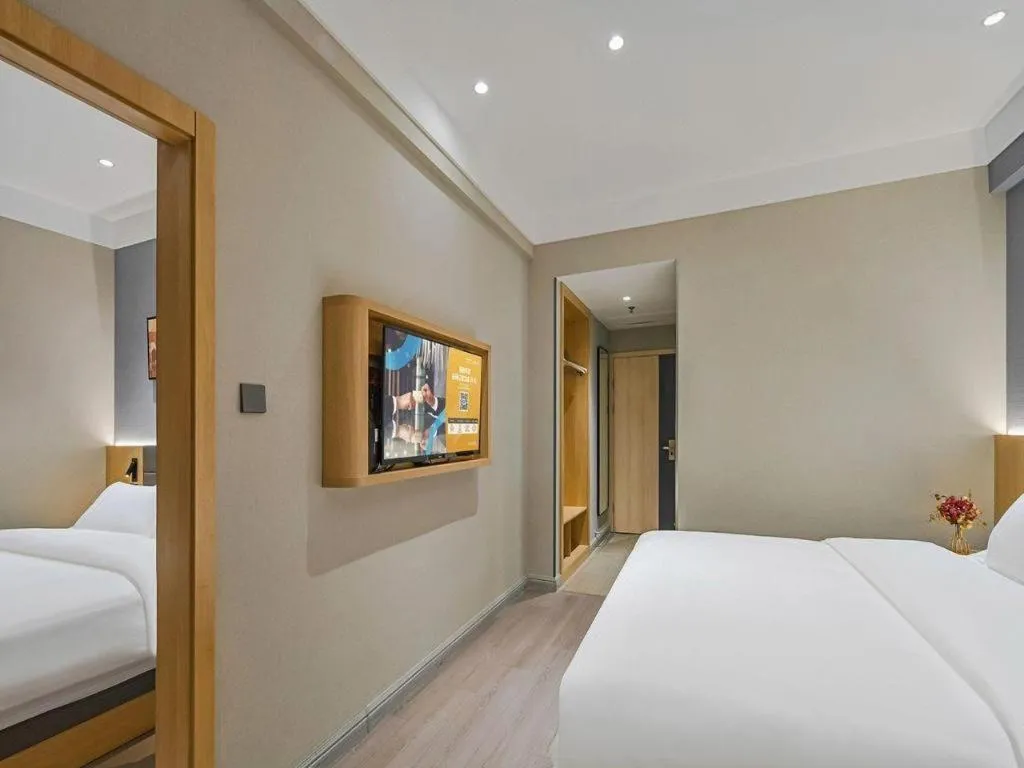 Bed in Jinjiang Inn Wuxi Liangqing Road Wanda Plaza Yunhe Bay Industrial Center