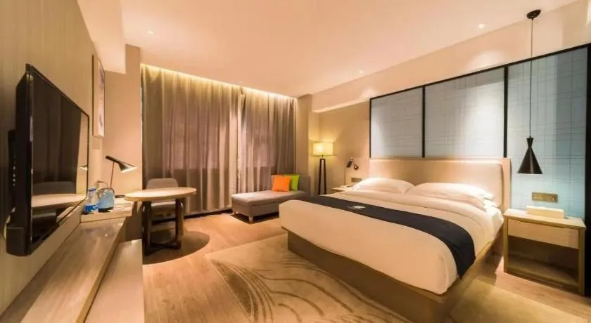 Bed in Echarm Hotel Wuhan Changjiang New District Gaoche Metro Station