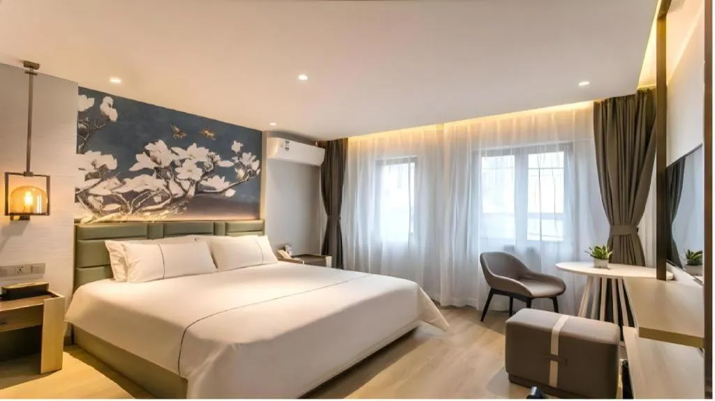 Bed in Magnotel Hotel Suzhou Shiquan Street Wangshiyuan