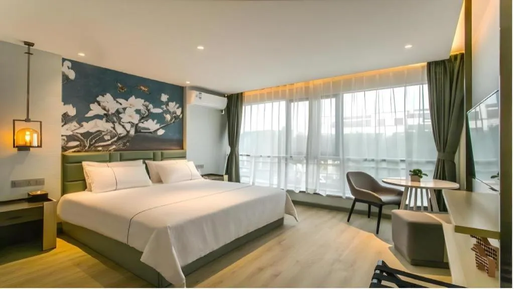Bed in Magnotel Hotel Suzhou Shiquan Street Wangshiyuan