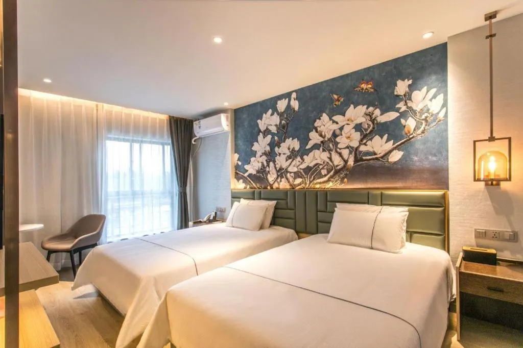 Bed in Magnotel Hotel Suzhou Shiquan Street Wangshiyuan