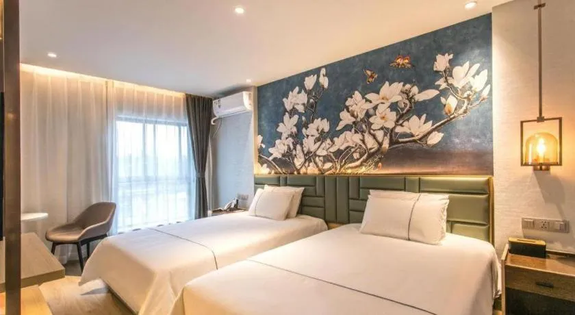 Bed in Magnotel Hotel Suzhou Shiquan Street Wangshiyuan