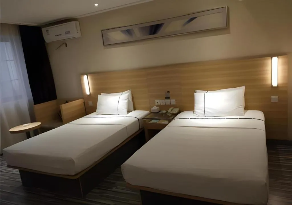 Bed in City Comfort Inn Wuhan Wangjiawan Yulong Road Metro Station