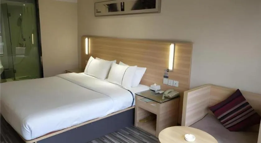 Bed in City Comfort Inn Wuhan Wangjiawan Yulong Road Metro Station