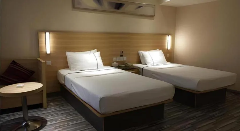 Bed in City Comfort Inn Wuhan Wangjiawan Yulong Road Metro Station