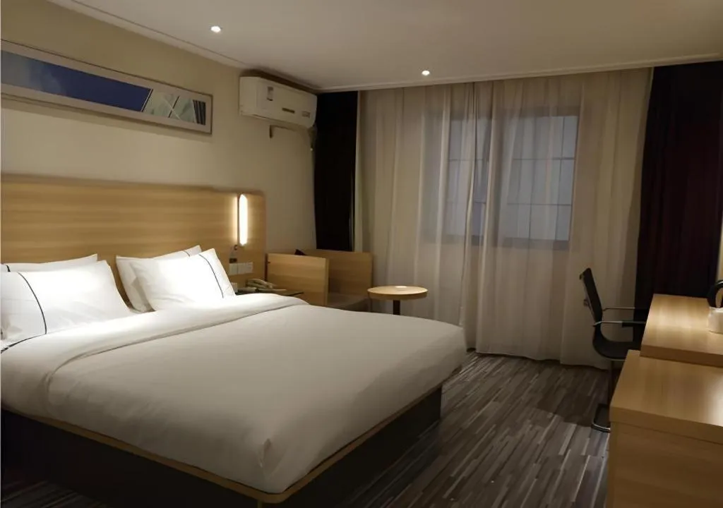 Bed in City Comfort Inn Wuhan Wangjiawan Yulong Road Metro Station