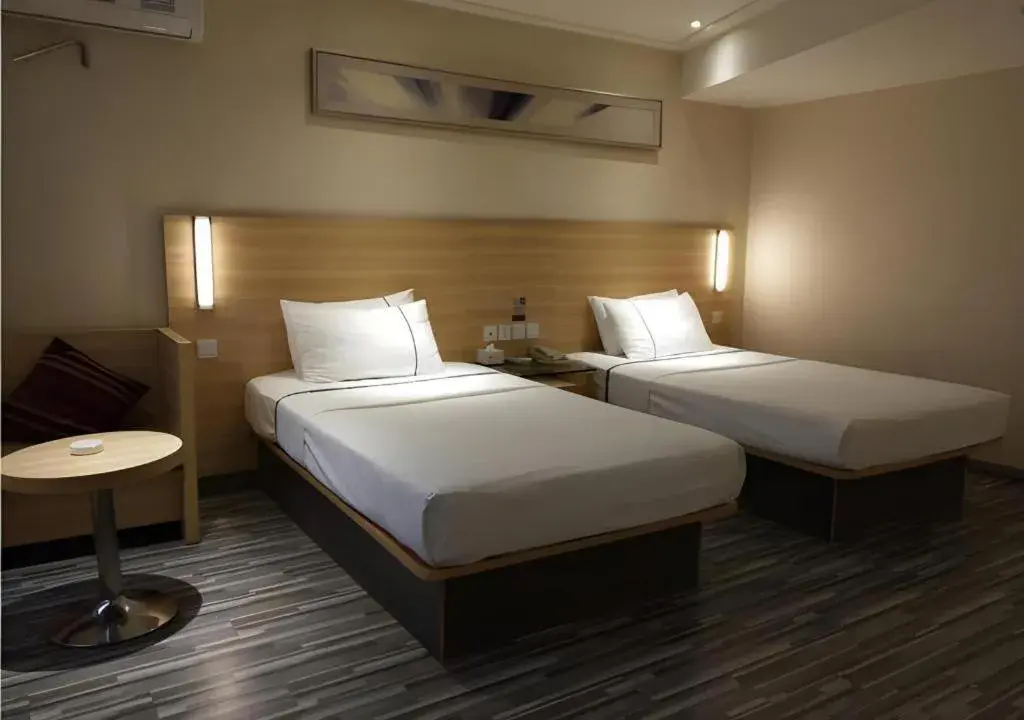 Bed in City Comfort Inn Wuhan Wangjiawan Yulong Road Metro Station Bed in City Comfort Inn Wuhan Wangjiawan Yulong Road Metro Station