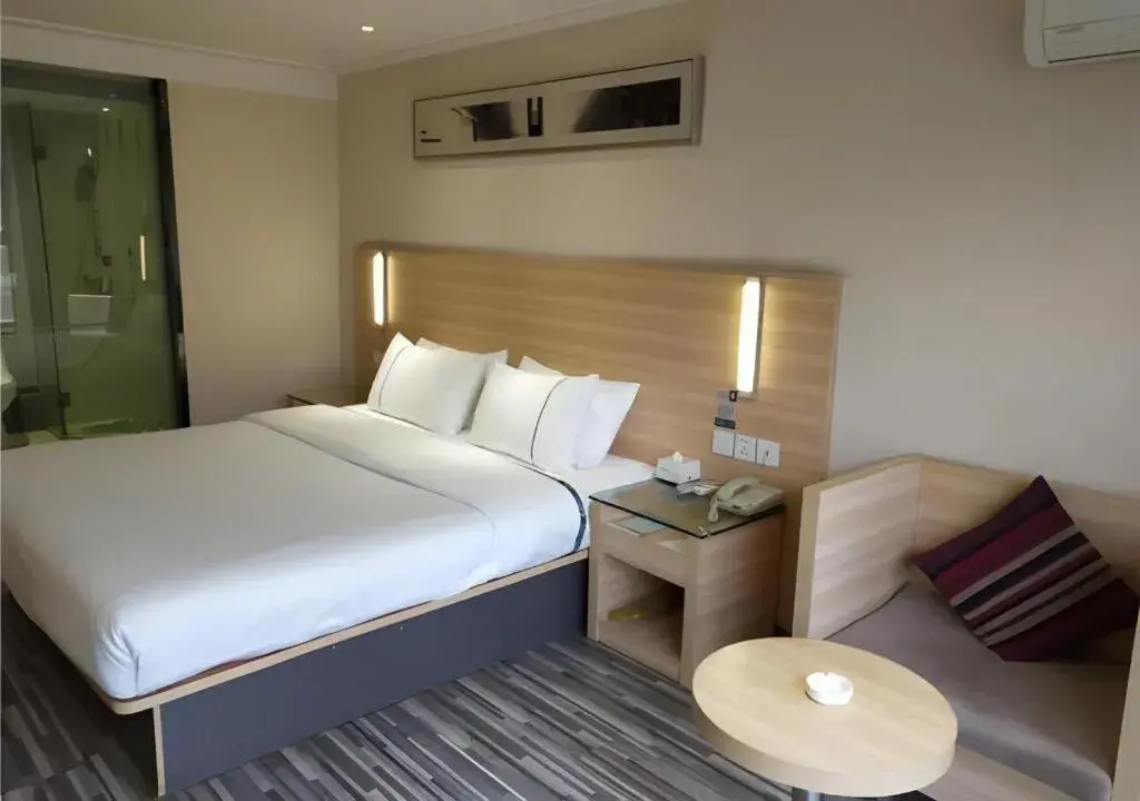 Bed in City Comfort Inn Wuhan Wangjiawan Yulong Road Metro Station Bed in City Comfort Inn Wuhan Wangjiawan Yulong Road Metro Station