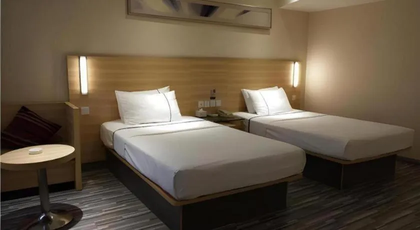 Bed in City Comfort Inn Wuhan Wangjiawan Yulong Road Metro Station