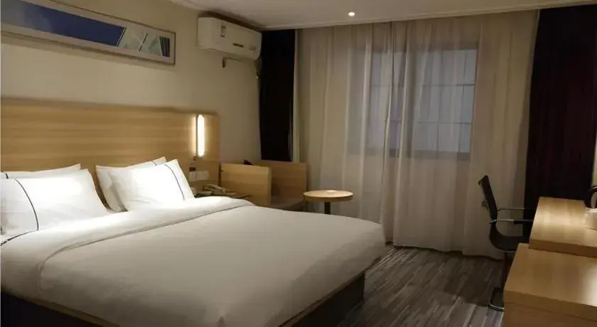 Bed in City Comfort Inn Wuhan Wangjiawan Yulong Road Metro Station Bed in City Comfort Inn Wuhan Wangjiawan Yulong Road Metro Station
