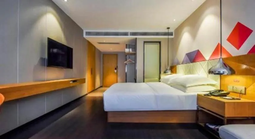 Bed in Borrman Hotel Guangzhou Quzhuang Metro Station