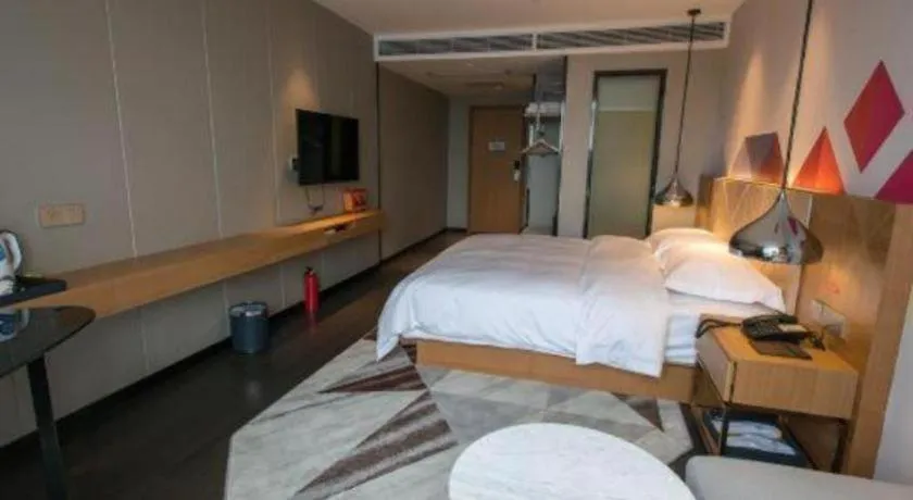 Bed in Borrman Hotel Guangzhou Quzhuang Metro Station