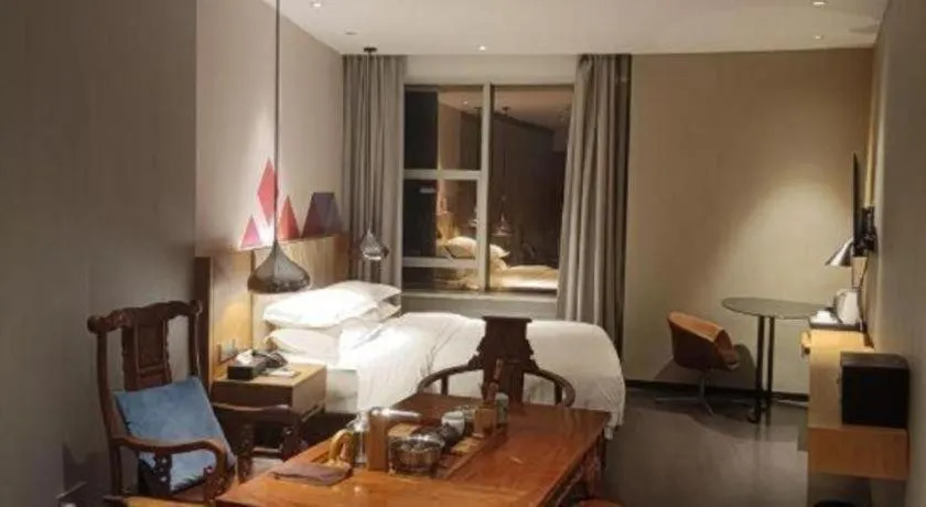 Bed in Borrman Hotel Guangzhou Quzhuang Metro Station