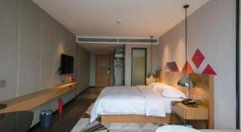 Bed in Borrman Hotel Guangzhou Quzhuang Metro Station