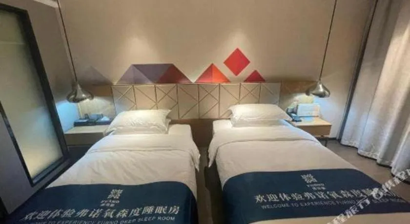 Bed in Borrman Hotel Guangzhou Quzhuang Metro Station