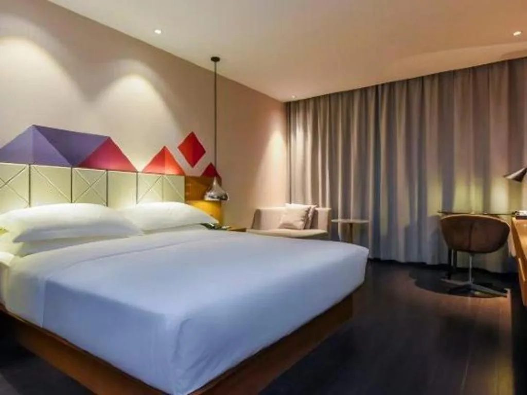 Bed in Borrman Hotel Guangzhou Quzhuang Metro Station