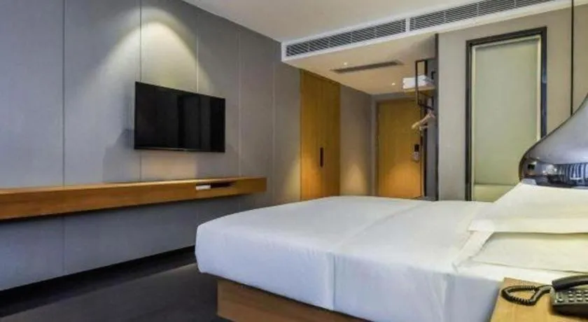 Bed in Borrman Hotel Guangzhou Quzhuang Metro Station