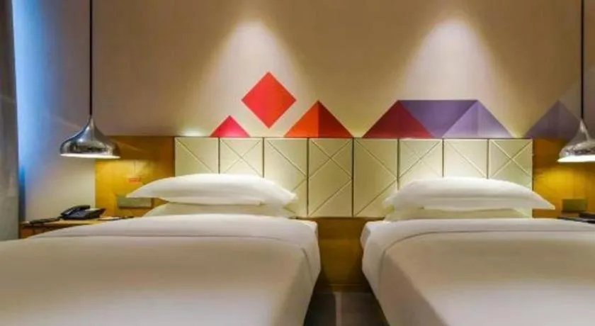 Bed in Borrman Hotel Guangzhou Quzhuang Metro Station