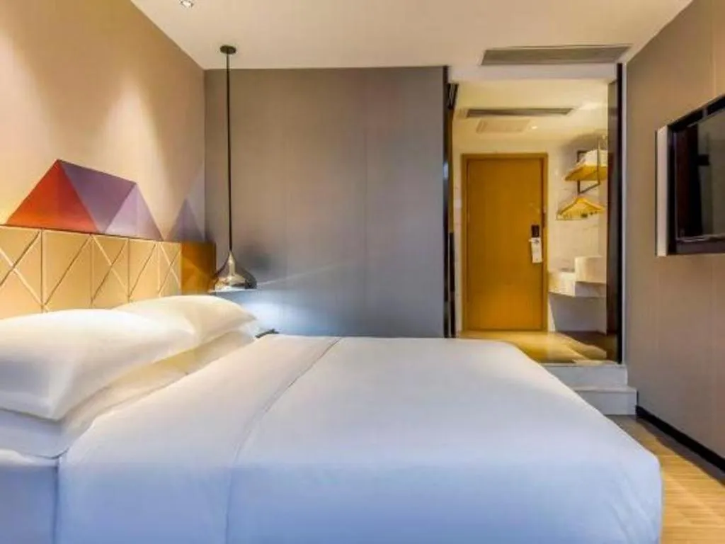 Bed in Borrman Hotel Guangzhou Quzhuang Metro Station